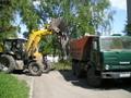 Вывоз строительного  и бытового мусора самосвалами КАМАЗ. Погрузка